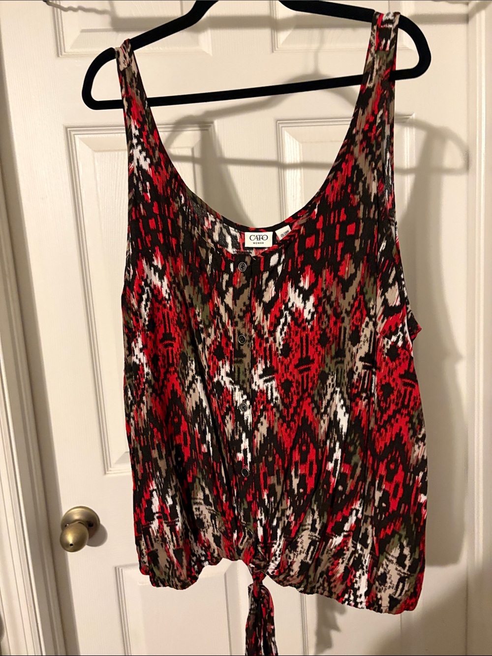 Cato size 26/28W sleeveless. Ties on bottom